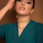 flamenco-dancer-model-blue-outfit-dance-updo-romantic-posing_114579-8610